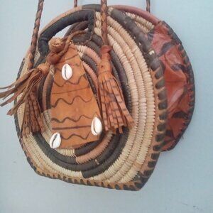 Round  Small Leather Handbag Purse, Long Strap. With cowry shells